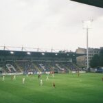 a group of people playing football