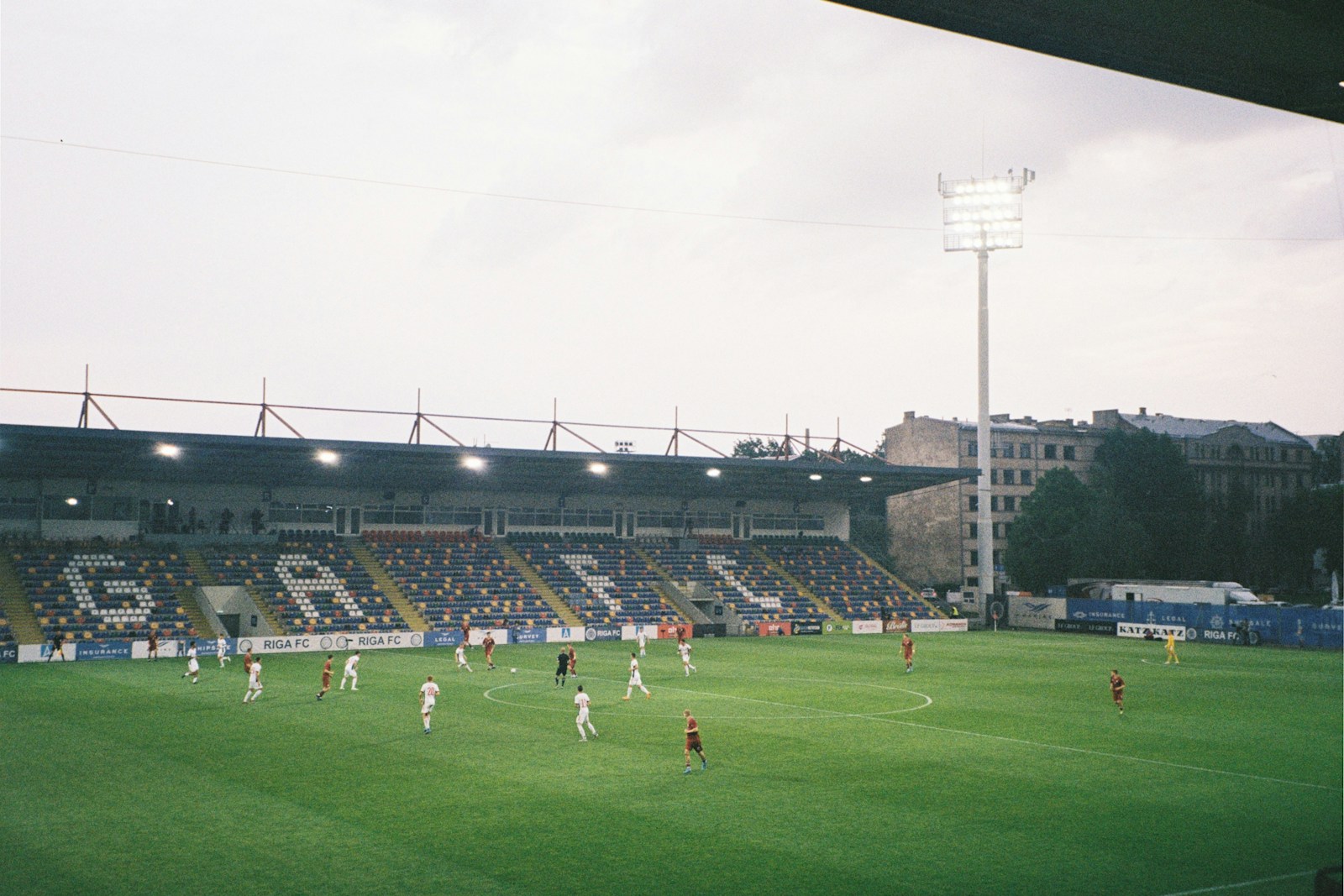 a group of people playing football